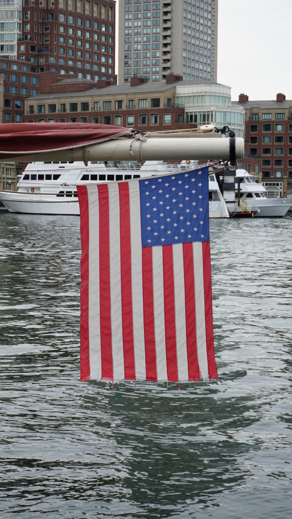 american flag boston harbor, the-alyst.com